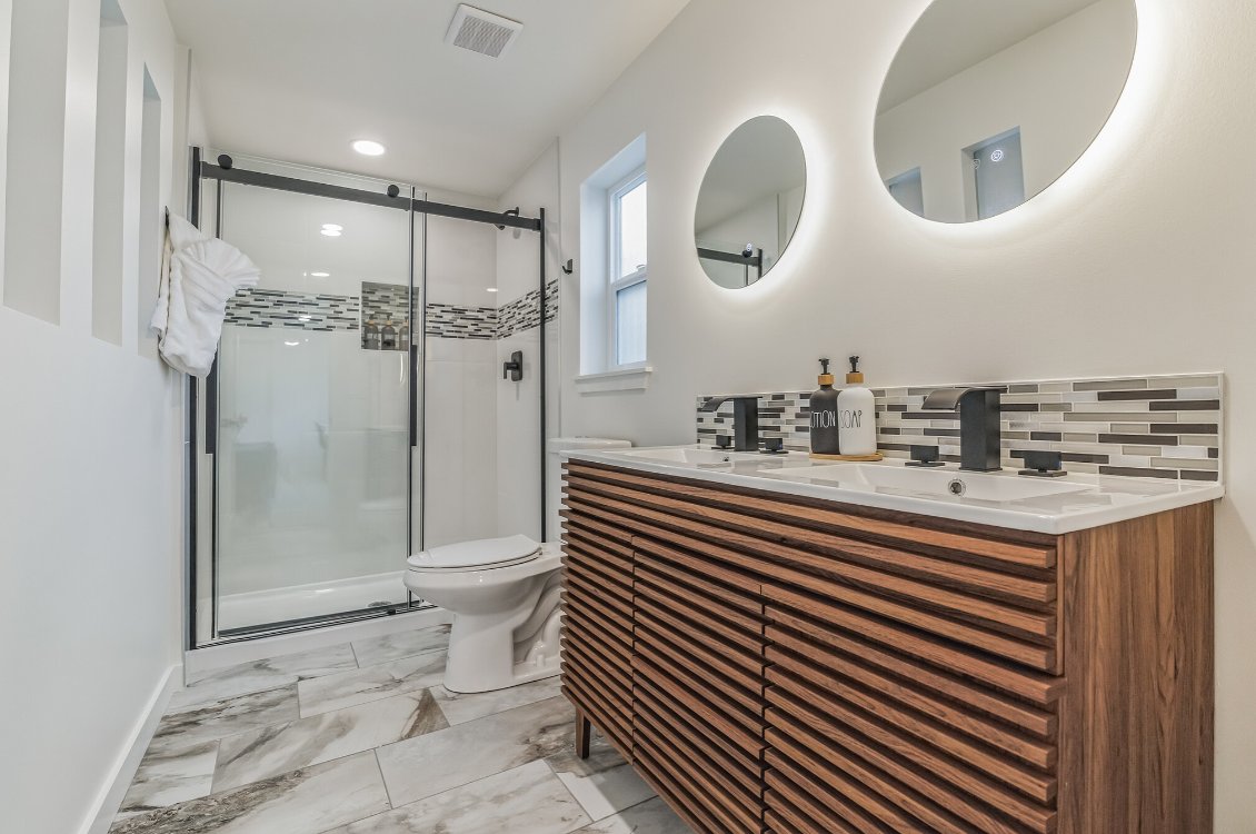 Updated bathroom with dual vanity
