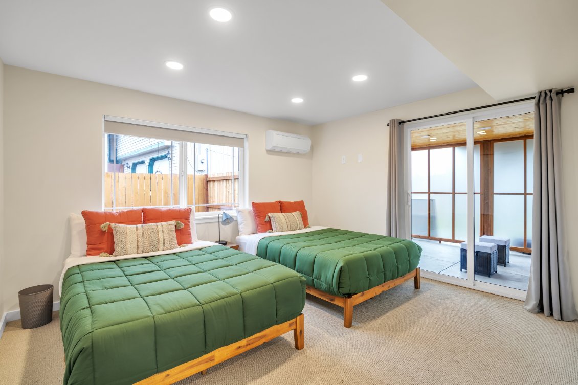 Guest bedroom with patio access