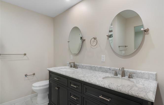 Bathroom with marble vanity